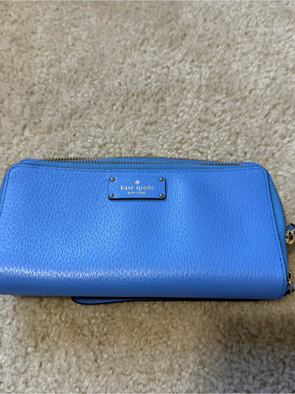 kate spade bright blue zip-around pebbled leather wallet